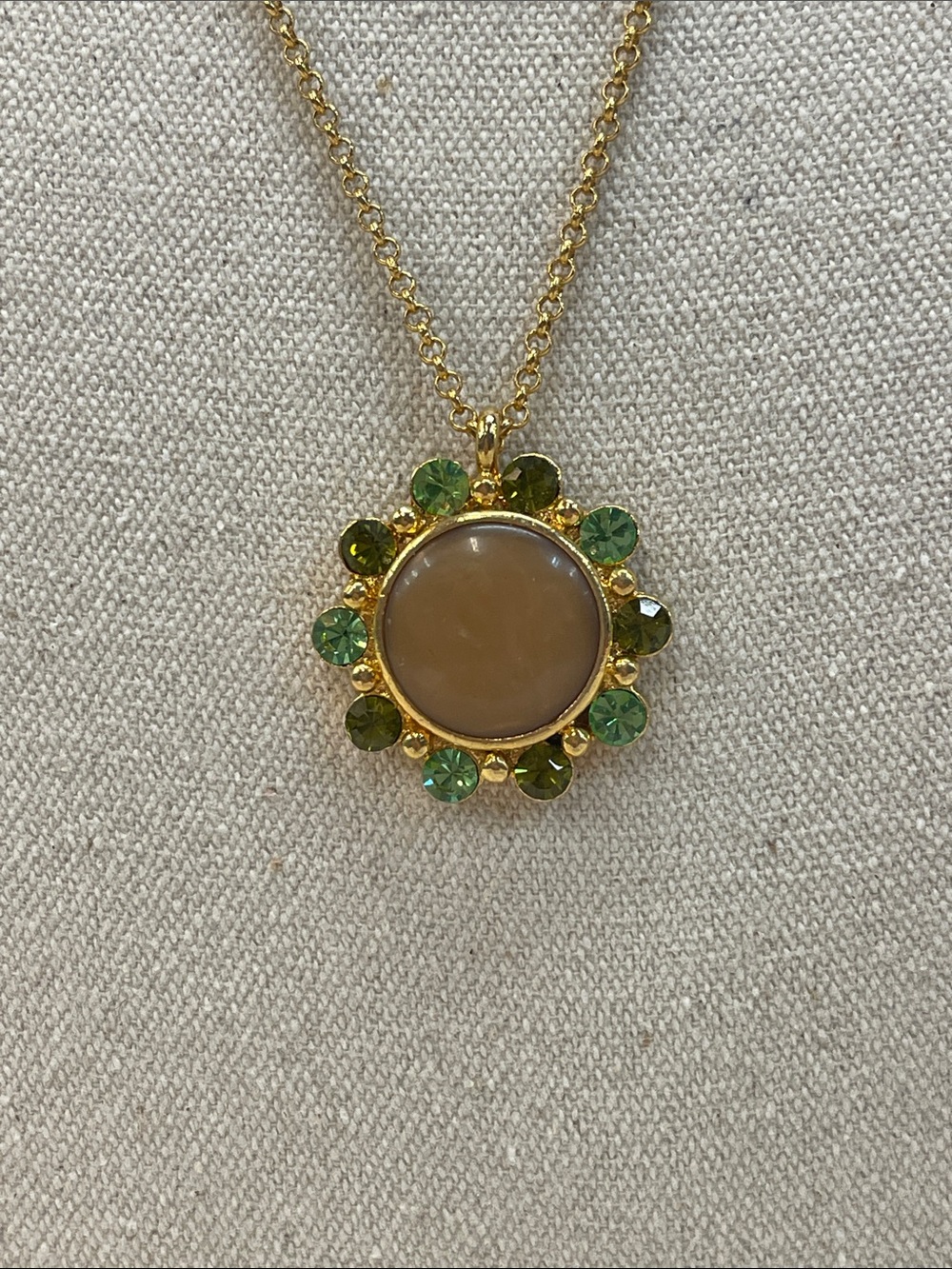 Gold-Tone Necklace with Beige Center and Green Crystal Halo